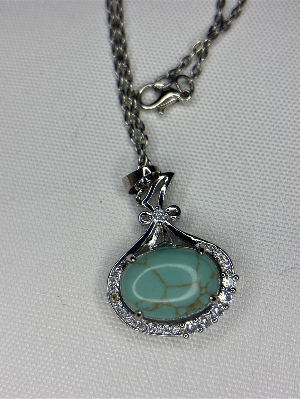 Turquoise dyed Howlite rhinestone encrusted silver necklace